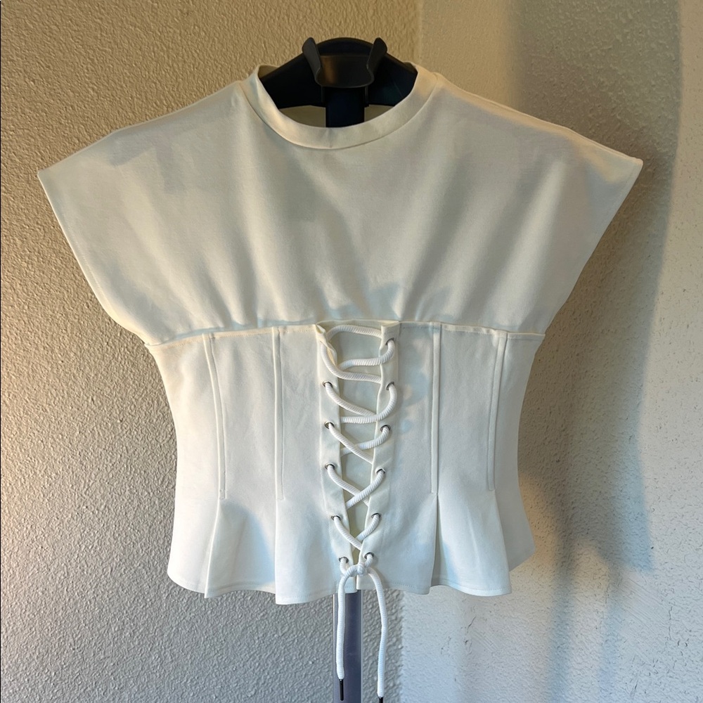 Elegant White Lace-Up Blouse